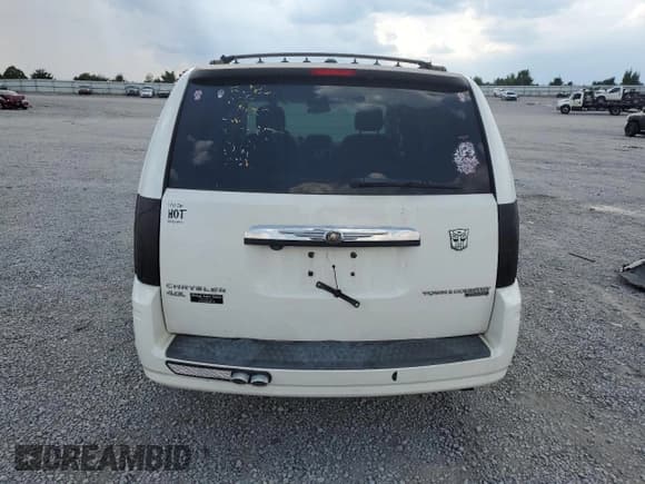 ✅ 2010 Chrysler Town & Country Touring Plus • VIN: 2A4RR8DX8AR480664 • Lot: 69492705. Wystawiony na Copart z przebiegiem 233 855 mil. Bezpłatny archiwum sprzedaży aukcyjnych z USA i szczegółowy raport historii pojazdu na DreamBid. Zdjęcie 6.