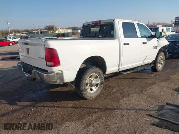 ✅ 2014 Ram 2500 Tradesman • VIN: 3C6TR5CT0EG225759 • Lot: 43711623. Listed on IAAI with 270,178 mi. Free auction sales archive from the USA and detailed vehicle history report at DreamBid. Image 4.