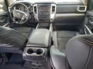 ✅ 2016 Nissan Titan Platinum Reserve • VIN: 1N6BA1F49GN513358 • Lot: 96068105. Listed on Copart with 84,665 mi. Free auction sales archive from the USA and detailed vehicle history report at DreamBid. Image 8.