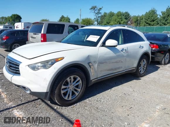 ✅ 2015 Infiniti QX70 • VIN: JN8CS1MU3FM381682 • Lot: 43160141. Listed on IAAI with 142,404 mi. Free auction sales archive from the USA and detailed vehicle history report at DreamBid. Image 2.