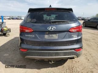 ✅ 2015 Hyundai Santa Fe • VIN: 5XYZTDLB0FG279102 • Лот: 68552114. Опубликован ранее на Copart с пробегом 165 318 миль. Бесплатный доступ к архиву аукционных продаж из США и подробный отчёт об истории автомобиля на DreamBid. Изображение 6.