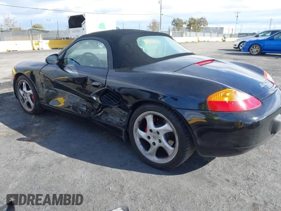 ✅ 2001 Porsche Boxster S • VIN: WP0CB29891U661404 • Lot: 43628729. Listed on IAAI with 77,428 mi. Free auction sales archive from the USA and detailed vehicle history report at DreamBid. Image 3.