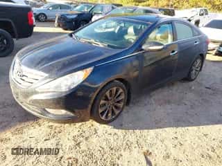 2013 Hyundai Sonata SE z VIN 5NPEC4AB4DH518139, wystawiony jako IAAI lot #43528847 z przebiegiem 156 262 mil mil oraz . Historia ofert i sprzedaży dostępna na DreamBid. Obrazek 2.