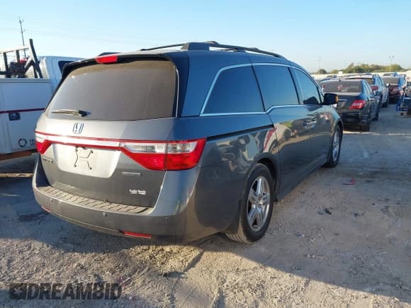 ✅ 2012 Honda Odyssey Touring • VIN: 5FNRL5H92CB069468 • Lot: 43429356. Listed on IAAI with 152,503 mi. Free auction sales archive from the USA and detailed vehicle history report at DreamBid. Image 4.