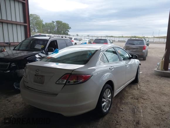 ✅ 2012 Mazda 6 i Touring • VIN: 1YVHZ8DH3C5M06525 • Lot: 43069583. Listed on IAAI with 200,304 mi. Free auction sales archive from the USA and detailed vehicle history report at DreamBid. Image 4.