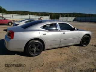 2010 Dodge Charger SXT с VIN 2B3CA3CV7AH285801, выставлен на аукционе Copart как лот 75801874 с пробегом 221 337 миль миль и Списание • Salvage title. История ставок и продаж доступна на DreamBid. Изображение 3.