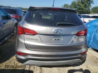 2018 Hyundai Santa Fe 2.4L z VIN 5XYZT3LB7JG559148, wystawiony jako Copart lot #84760925 z przebiegiem 147 179 mil mil oraz Czysty tytuł • Clean title. Historia ofert i sprzedaży dostępna na DreamBid. Obrazek 6.