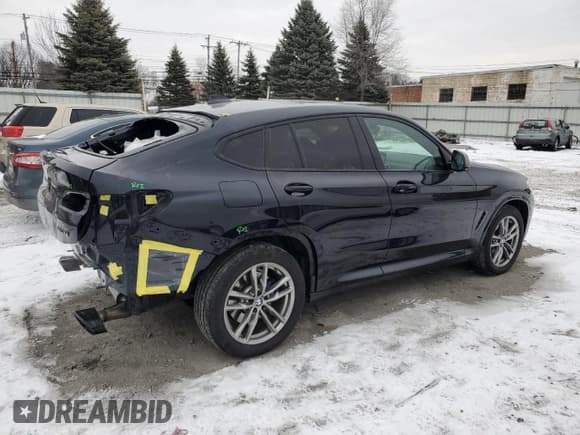 ✅ 2021 BMW X4 M40i • VIN: 5UX2V5C06M9F70459 • Lot: 87397614. Listed on Copart with 35,233 mi. Free auction sales archive from the USA and detailed vehicle history report at DreamBid. Image 3.