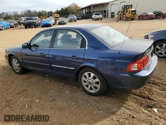 ✅ 2005 Kia Optima LX • VIN: KNAGD128955423159 • Lot: 84280734. Listed on Copart with 92,428 mi. Free auction sales archive from the USA and detailed vehicle history report at DreamBid. Image 2.
