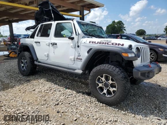 ✅ 2023 Jeep Wrangler Rubicon • VIN: 1C4HJXFN8PW619755 • Lot: 62449735. Listed on Copart with 23,910 mi. Free auction sales archive from the USA and detailed vehicle history report at DreamBid. Image 4.
