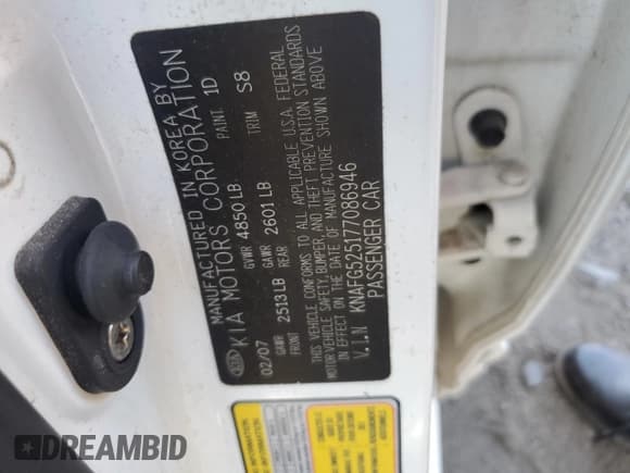 ✅ 2007 Kia Rondo LX • VIN: KNAFG525177086946 • Lot: 85117845. Listed on Copart with 58,293 mi. Free auction sales archive from the USA and detailed vehicle history report at DreamBid. Image 12.