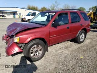 ✅ 2004 Isuzu Rodeo S • VIN: 4S2CK58W444315609 • Lot: 51523965. Wystawiony na Copart z przebiegiem 208 503 mil. Bezpłatny archiwum sprzedaży aukcyjnych z USA i szczegółowy raport historii pojazdu na DreamBid. Zdjęcie 1.