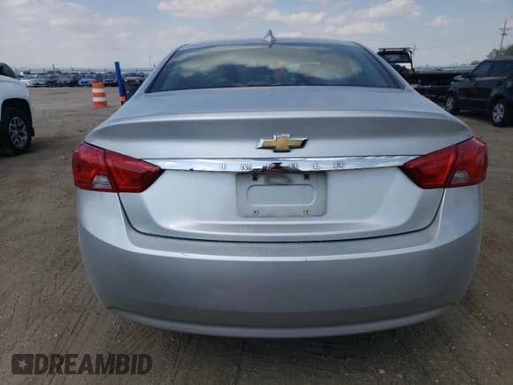✅ 2017 Chevrolet Impala LS • VIN: 1G11Z5SA6HU118144 • Лот: 71989284. Опубликован ранее на Copart с пробегом 159 007 миль. Бесплатный доступ к архиву аукционных продаж из США и подробный отчёт об истории автомобиля на DreamBid. Изображение 6.