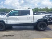 ✅ 2021 Ram 1500 Rebel • VIN: 1C6SRFLTXMN570577 • Lot: 42167696. Listed on IAAI with 114,164 mi. Free auction sales archive from the USA and detailed vehicle history report at DreamBid. Image 14.