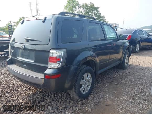 2010 Mercury Mariner z VIN 4M2CN8B79AKJ28843, wystawiony jako IAAI lot #40099437 z przebiegiem 203 467 mil mil oraz . Historia ofert i sprzedaży dostępna na DreamBid. Obrazek 4.