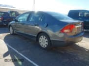 ✅ 2010 Honda Civic DX-VP • VIN: 19XFA1F31AE062174 • Lot: 43819108. Wystawiony na IAAI z przebiegiem 343 354 mil. Bezpłatny archiwum sprzedaży aukcyjnych z USA i szczegółowy raport historii pojazdu na DreamBid. Zdjęcie 3.