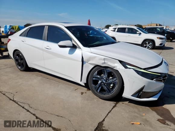 ✅ 2022 Hyundai Elantra SEL • VIN: 5NPLN4AG8NH075850 • Lot: 84373155. Listed on Copart with 31,165 mi. Free auction sales archive from the USA and detailed vehicle history report at DreamBid. Image 4.