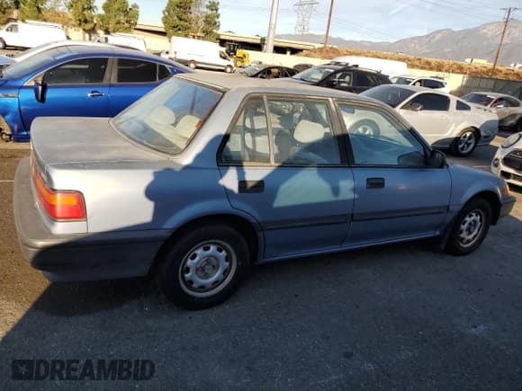 ✅ 1990 Honda Civic DX • VIN: 1HGED3641LL028318 • Lot: 77113314. Wystawiony na Copart z przebiegiem 122 144 mil. Bezpłatny archiwum sprzedaży aukcyjnych z USA i szczegółowy raport historii pojazdu na DreamBid. Zdjęcie 3.