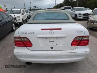 ✅ 2000 Mercedes-Benz CLK 320/430 • VIN: WDBLK70G2YT034673 • Лот: 74668434. Опубликован ранее на Copart с пробегом Не указан. Бесплатный доступ к архиву аукционных продаж из США и подробный отчёт об истории автомобиля на DreamBid. Изображение 6.