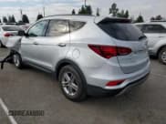 ✅ 2018 Hyundai Santa Fe 2.4L • VIN: 5XYZU3LB7JG517849 • Lot: 93773105. Listed on Copart with 16,936 mi. Free auction sales archive from the USA and detailed vehicle history report at DreamBid. Image 2.