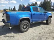 ✅ 2020 Chevrolet Colorado 4WD ZR2 • VIN: 1GCPTEE19L1176032 • Lot: 56003155. Listed on Copart with 44,548 mi. Free auction sales archive from the USA and detailed vehicle history report at DreamBid. Image 3.