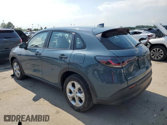 ✅ 2023 Honda HR-V LX • VIN: 3CZRZ1H38PM742696 • Lot: 66736165. Wystawiony na Copart z przebiegiem 27 515 mil. Bezpłatny archiwum sprzedaży aukcyjnych z USA i szczegółowy raport historii pojazdu na DreamBid. Zdjęcie 2.