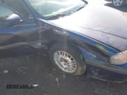 ✅ 2001 Chevrolet Impala • VIN: 2G1WF52E219209206 • Lot: 43387151. Listed on IAAI with 94,960 mi. Free auction sales archive from the USA and detailed vehicle history report at DreamBid. Image 6.