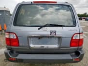 ✅ 2001 Lexus LX 470 • VIN: JTJHT00W313508801 • Lot: 62773925. Listed on Copart with 118,013 mi. Free auction sales archive from the USA and detailed vehicle history report at DreamBid. Image 6.