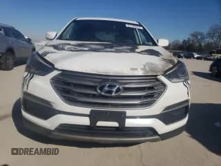 ✅ 2018 Hyundai Santa Fe 2.4L • VIN: 5NMZTDLB4JH077362 • Лот: 41193374. Опубликован ранее на Copart с пробегом Не указан. Бесплатный доступ к архиву аукционных продаж из США и подробный отчёт об истории автомобиля на DreamBid. Изображение 5.