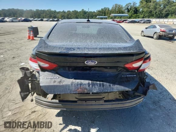 ✅ 2016 Ford Fusion Titanium • VIN: 3FA6P0D9XGR352548 • Lot: 70721425. Listed on Copart with 83,327 mi. Free auction sales archive from the USA and detailed vehicle history report at DreamBid. Image 6.