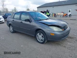✅ 2004 Ford Focus SE • VIN: 1FAFP34334W177338 • Lot: 42003202. Listed on IAAI with 190,581 mi. Free auction sales archive from the USA and detailed vehicle history report at DreamBid. Image 1.
