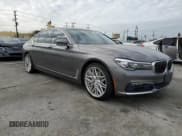 ✅ 2017 BMW 7 Series 740i • VIN: WBA7E2C52HG739390 • Lot: 81669495. Listed on Copart with 124,451 mi. Free auction sales archive from the USA and detailed vehicle history report at DreamBid. Image 4.