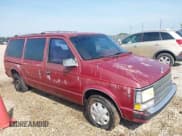 ✅ 1990 Plymouth Grand Voyager • VIN: 1P4FH44R3LX160156 • Lot: 42578765. Listed on IAAI with 187,704 mi. Free auction sales archive from the USA and detailed vehicle history report at DreamBid. Image 1.