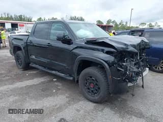 ✅ 2023 Toyota Tundra TRD Pro Hybrid • VIN: 5TFPC5DB3PX023501 • Лот: 41991952. Опубликован ранее на IAAI с пробегом 39 214 миль. Бесплатный доступ к архиву аукционных продаж из США и подробный отчёт об истории автомобиля на DreamBid. Изображение 1.