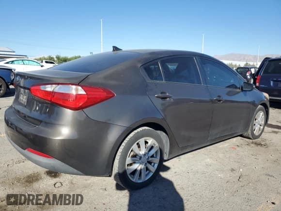 ✅ 2014 Kia Forte LX • VIN: KNAFX4A69E5161079 • Лот: 89722325. Опубликован ранее на Copart с пробегом 128 380 миль. Бесплатный доступ к архиву аукционных продаж из США и подробный отчёт об истории автомобиля на DreamBid. Изображение 3.