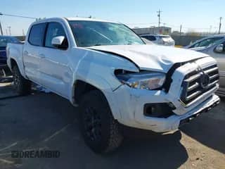 2022 Toyota Tacoma SR5 with VIN 3TMAZ5CN5NM174990, listed as a IAAI auction lot 42729091 with 54,547 mi miles and . Bid and sale history available at DreamBid. Image 1.