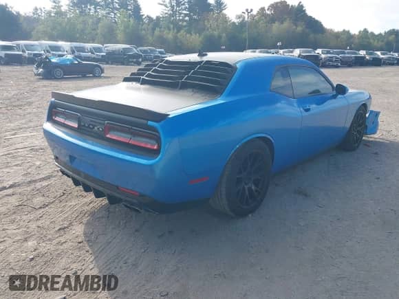 2015 Dodge Challenger R/T Plus z VIN 2C3CDZBT9FH804335, wystawiony jako IAAI lot #43386188 z przebiegiem 42 915 mil mil oraz . Historia ofert i sprzedaży dostępna na DreamBid. Obrazek 4.