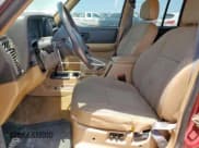 ✅ 1999 Jeep Cherokee Sport • VIN: 1J4FT68S5XL675839 • Lot: 65230005. Listed on Copart with 204,102 mi. Free auction sales archive from the USA and detailed vehicle history report at DreamBid. Image 7.