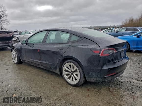 ✅ 2022 Tesla Model 3 • VIN: 5YJ3E1EA8NF370000 • Lot: 95893255. Listed on Copart with 106,623 mi. Free auction sales archive from the USA and detailed vehicle history report at DreamBid. Image 2.