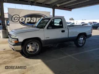 2000 Chevrolet Silverado 1500 LS with VIN 1GCEC14W3YZ279582, listed as a Copart auction lot 57668495 with 174,290 mi miles and Salvage title. Bid and sale history available at DreamBid. Image 1.