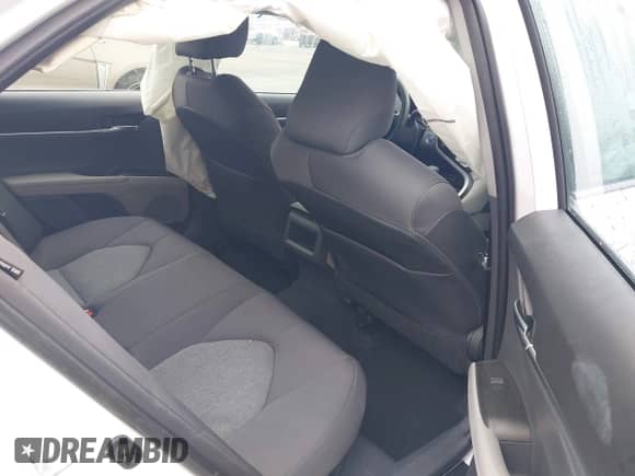 2021 Toyota Camry Hybrid LE with VIN 4T1C31AK8MU565617, listed as a IAAI auction lot 42260273 with 40,860 mi miles and . Bid and sale history available at DreamBid. Image 8.