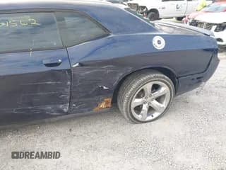 ✅ 2013 Dodge Challenger Rallye Redline • VIN: 2C3CDYAG7DH688015 • Lot: 41701562. Wystawiony na IAAI z przebiegiem 160 196 mil. Bezpłatny archiwum sprzedaży aukcyjnych z USA i szczegółowy raport historii pojazdu na DreamBid. Zdjęcie 6.