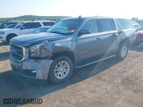 ✅ 2019 GMC Yukon XL SLT • VIN: 1GKS2GKC1KR236405 • Лот: 42939264. Опубликован ранее на IAAI с пробегом 199 856 миль. Бесплатный доступ к архиву аукционных продаж из США и подробный отчёт об истории автомобиля на DreamBid. Изображение 2.
