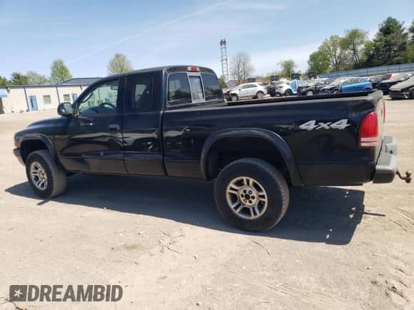 2003 Dodge Dakota Sport z VIN 1D7HG32N63S164313, wystawiony jako Copart lot #54088715 z przebiegiem 280 998 mil mil oraz Szkoda całkowita • Salvage title. Historia ofert i sprzedaży dostępna na DreamBid. Obrazek 2.