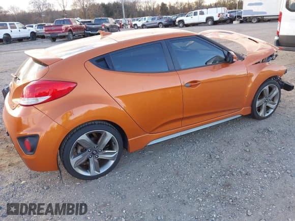 ✅ 2013 Hyundai Veloster Turbo • VIN: KMHTC6AE4DU113168 • Lot: 43706602. Listed on IAAI with 152,218 mi. Free auction sales archive from the USA and detailed vehicle history report at DreamBid. Image 4.