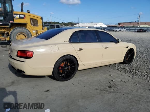 ✅ 2014 Bentley Flying Spur • VIN: SCBEC9ZA5EC089716 • Lot: 70884943. Wystawiony na Copart z przebiegiem Nie podano. Bezpłatny archiwum sprzedaży aukcyjnych z USA i szczegółowy raport historii pojazdu na DreamBid. Zdjęcie 3.