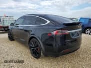 ✅ 2017 Tesla Model X P90D • VIN: 5YJXCAE49HF077650 • Lot: 66477832. Listed on Copart with 75,558 mi. Free auction sales archive from the USA and detailed vehicle history report at DreamBid. Image 2.