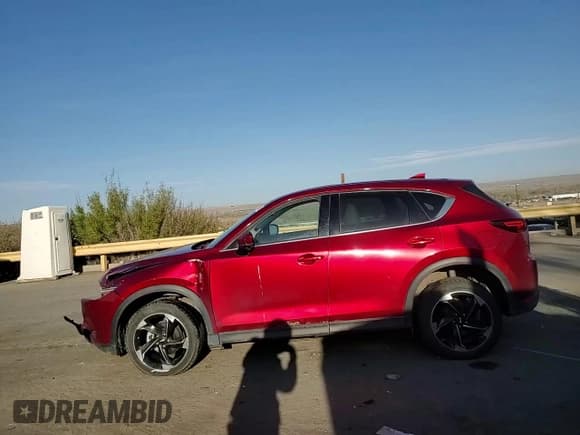 ✅ 2018 Mazda CX-5 Grand Touring • VIN: JM3KFBDMXJ0390680 • Lot: 51654345. Listed on Copart with 67,167 mi. Free auction sales archive from the USA and detailed vehicle history report at DreamBid. Image 12.