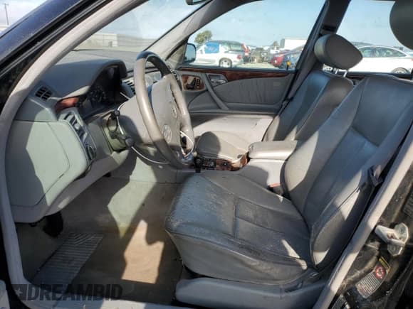 ✅ 2000 Mercedes-Benz E 320/430 4 Matic • VIN: WDBJH82F3YX027661 • Lot: 64070895. Wystawiony na Copart z przebiegiem 158 877 mil. Bezpłatny archiwum sprzedaży aukcyjnych z USA i szczegółowy raport historii pojazdu na DreamBid. Zdjęcie 7.