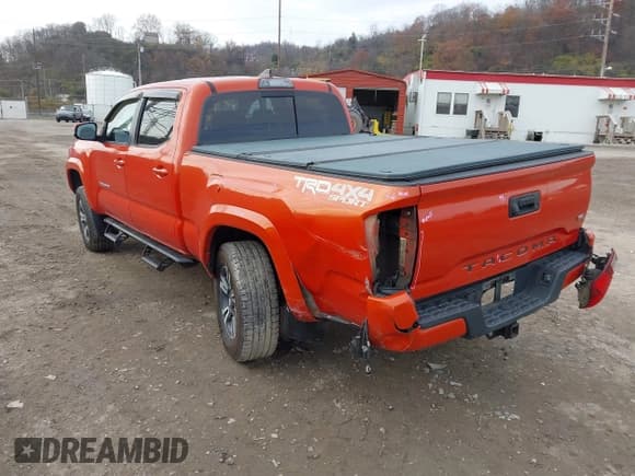 ✅ 2017 Toyota Tacoma SR5 • VIN: 3TMDZ5BN7HM014046 • Lot: 43777744. Listed on IAAI with 130,773 mi. Free auction sales archive from the USA and detailed vehicle history report at DreamBid. Image 3.